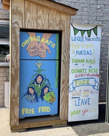 The community fridge, decorated with words like Comida Gratis, used with permission from its Instagram page 